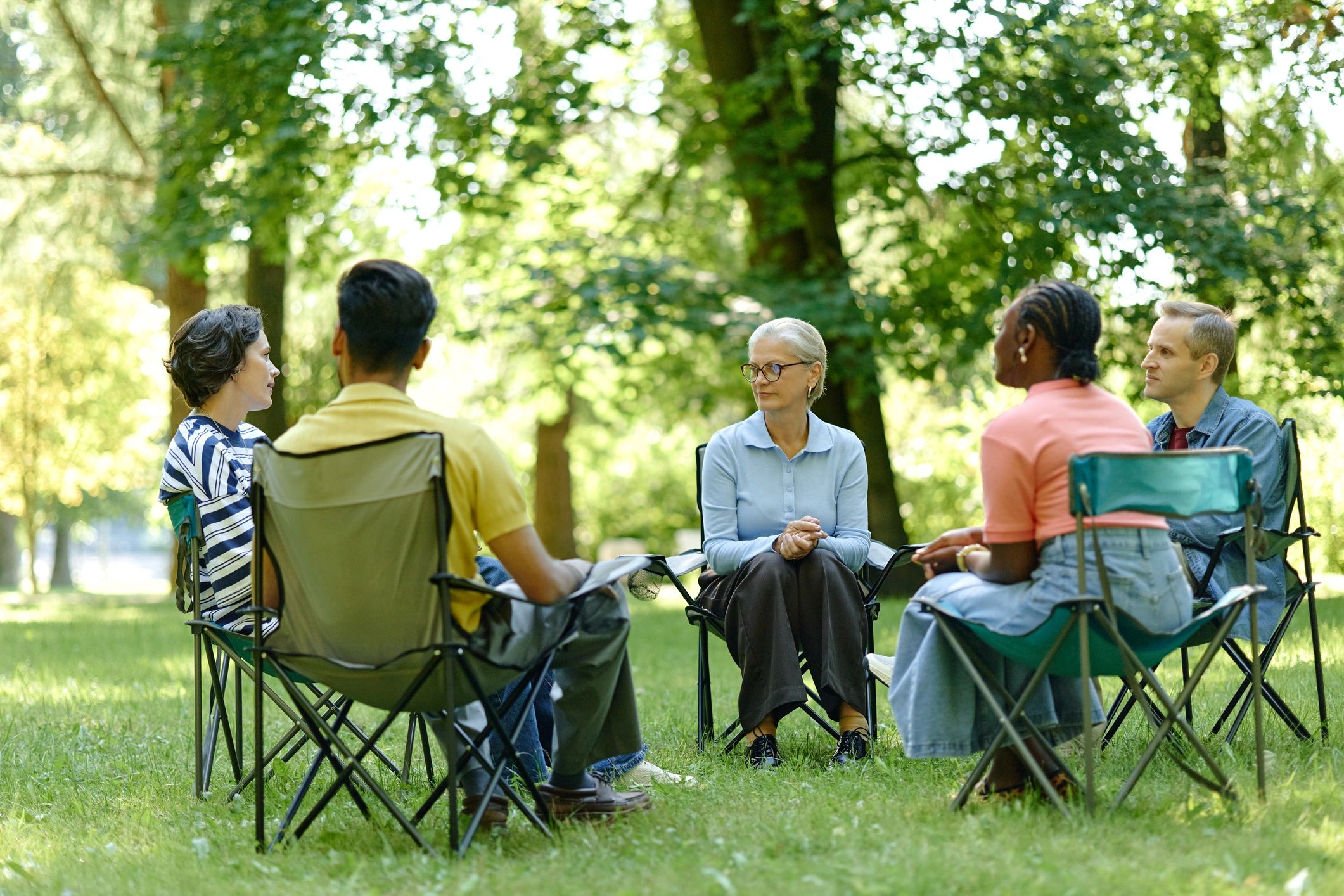 Support group session in a calm outdoor setting